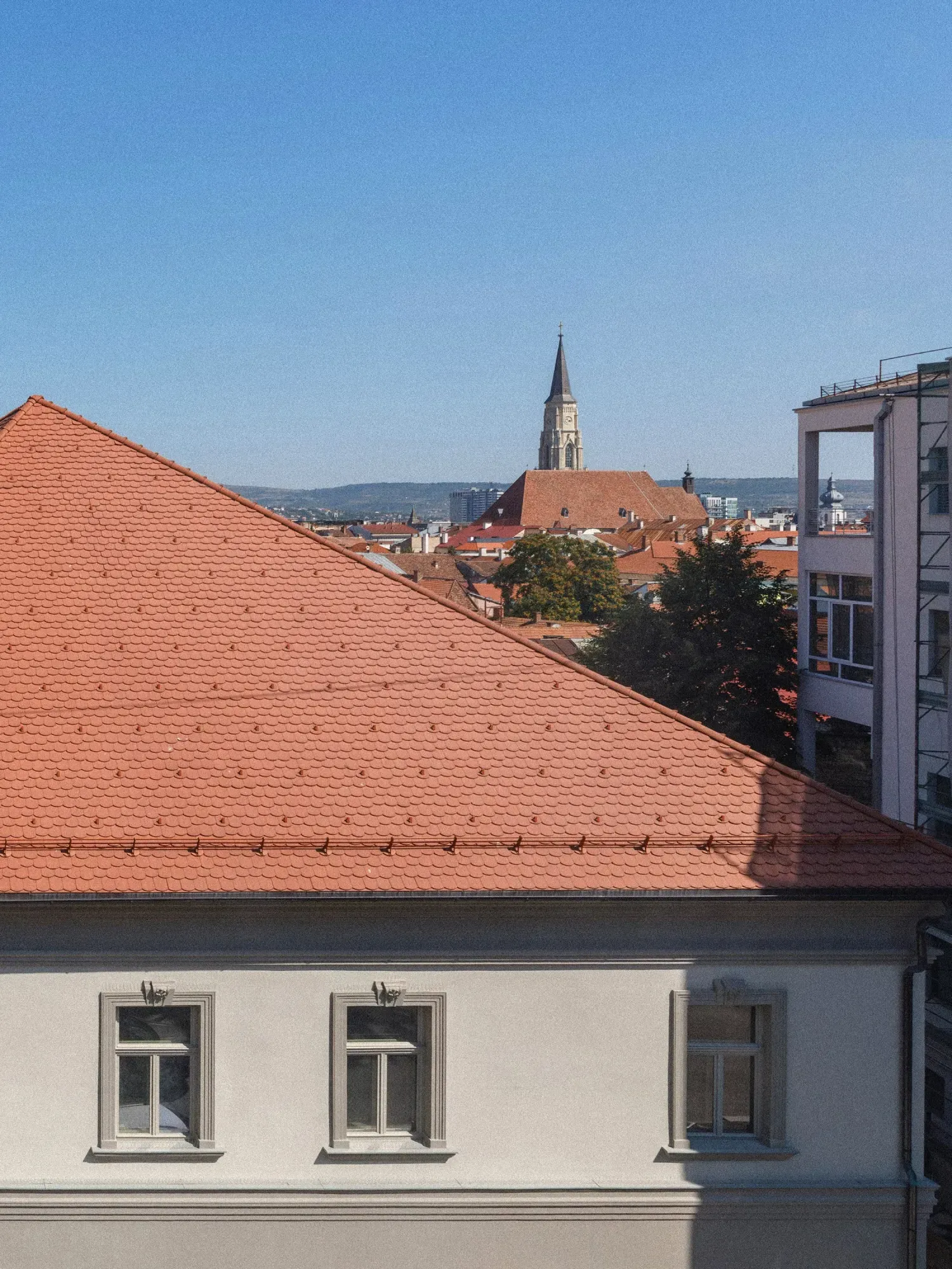 The roof of the house, with the tower of St Michael’s Church behind