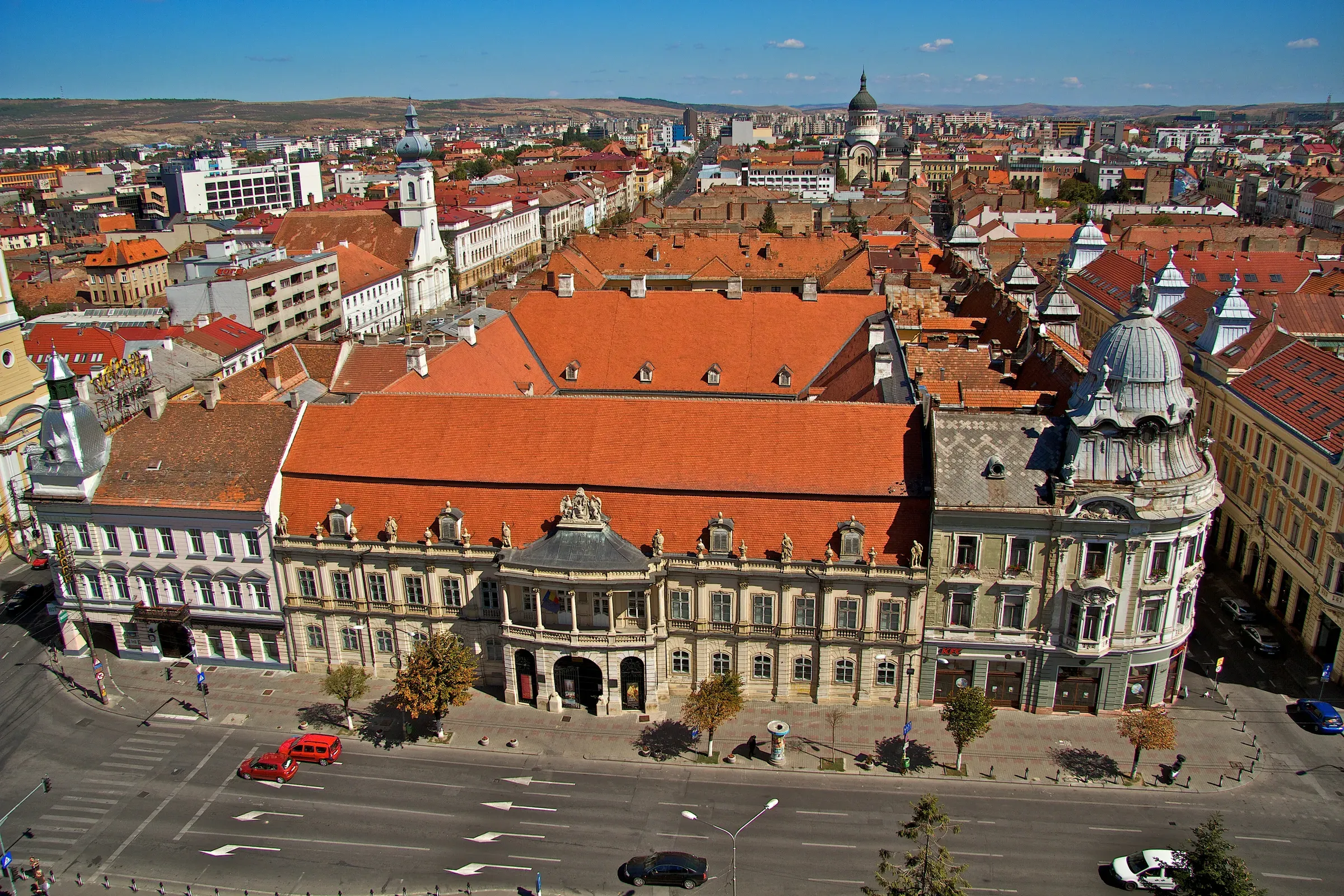 The Bánffy Palace on Piața Unirii from above, with its tiled roof and courtyard