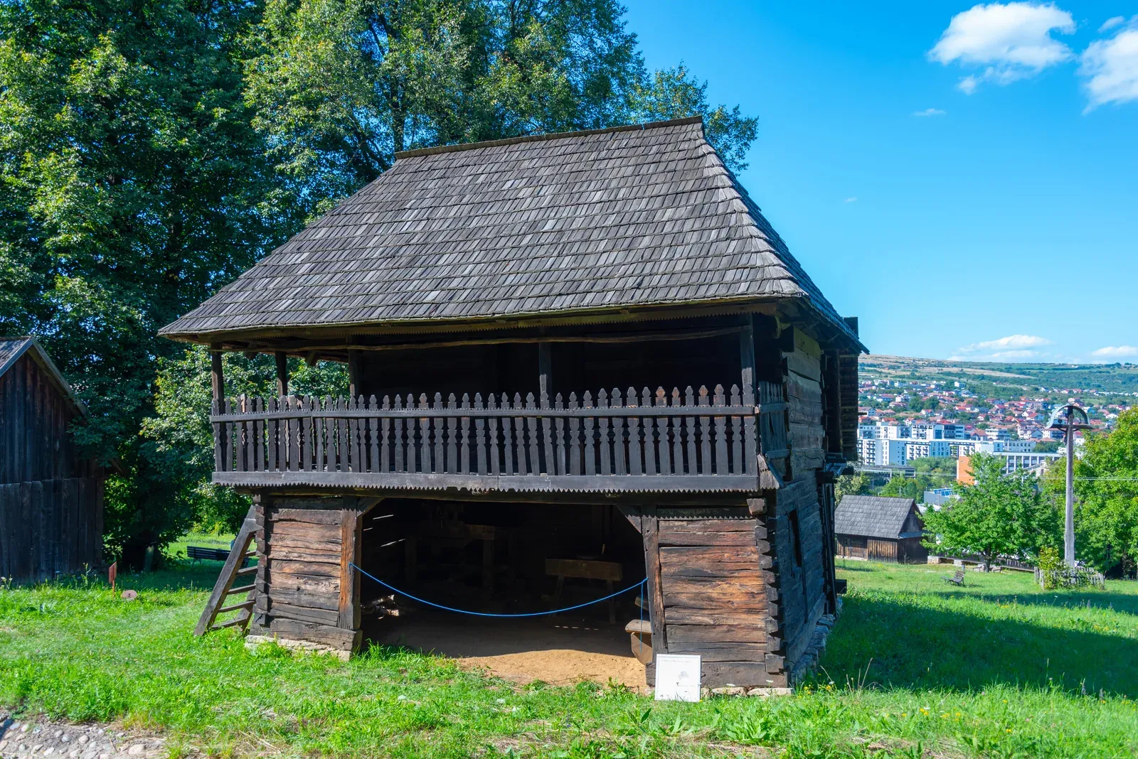 A granary raised on posts, with a timber gallery